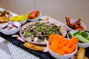 Plates of snacks and dips for a conference.